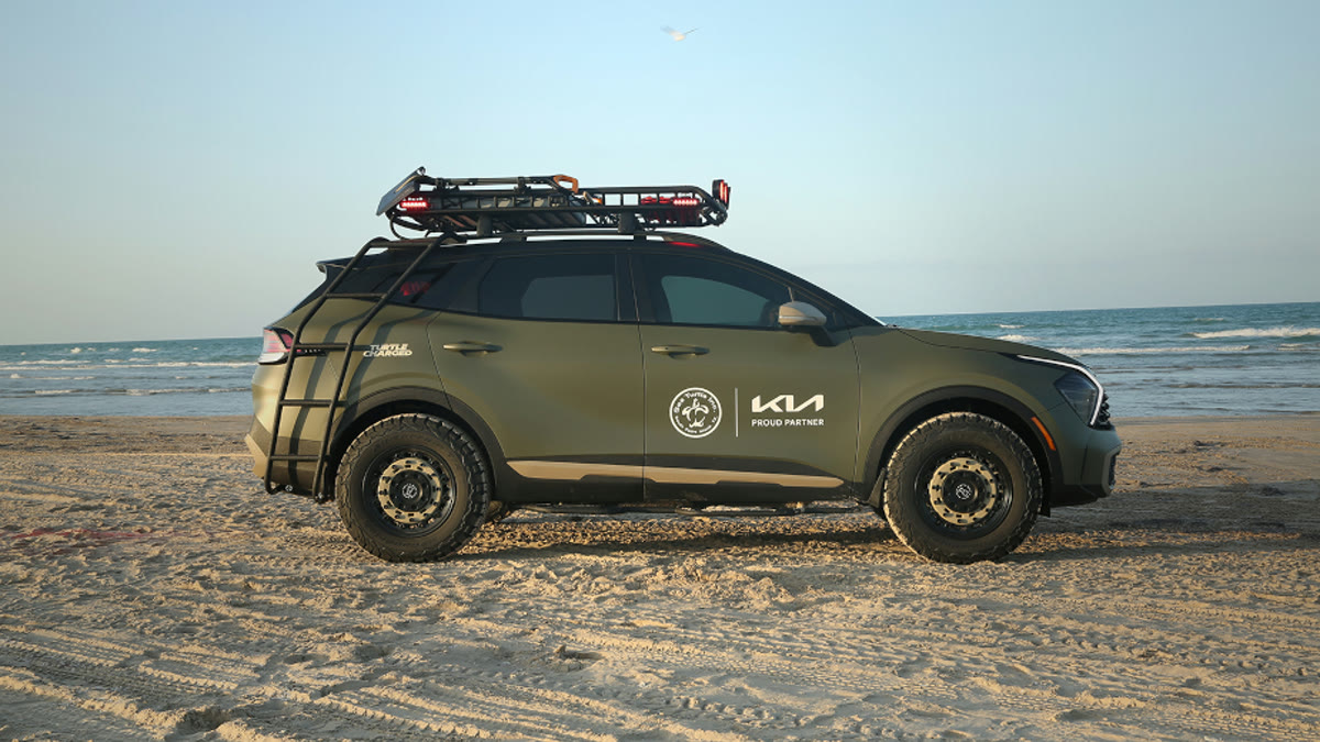 Customized Kia Sportage X-Pro sea turtle rescue vehicle on a beach